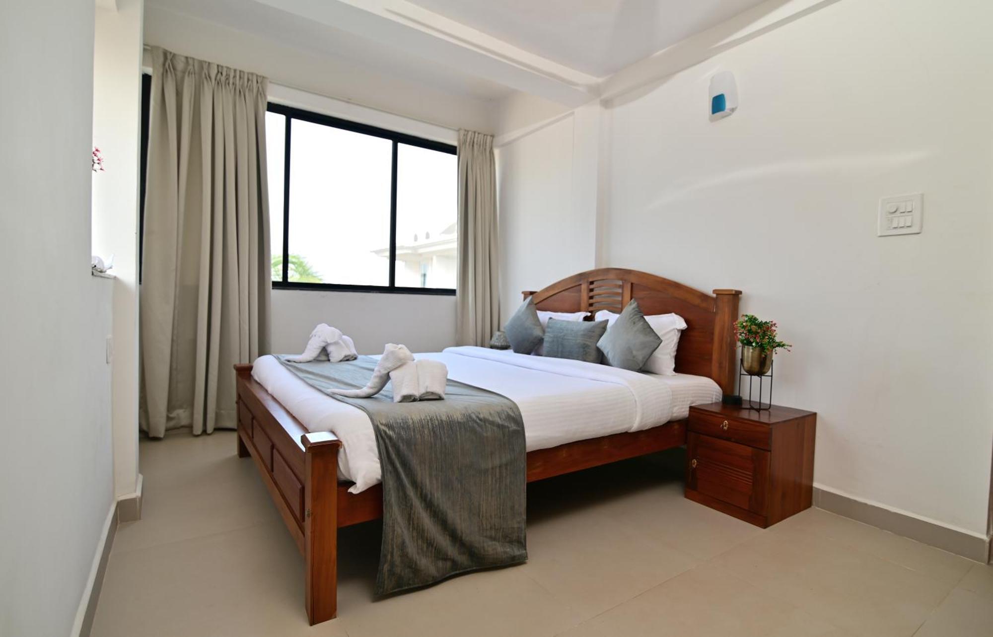 Hotel Q Lite Calangute Esterno foto